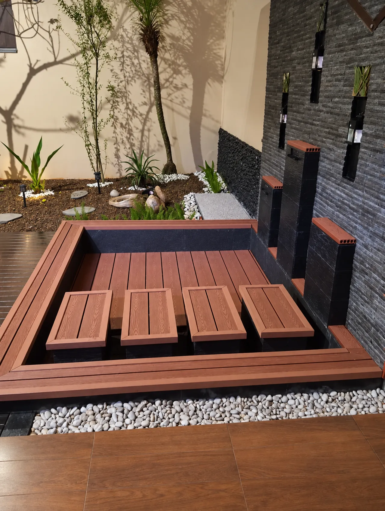 Decking WPC Champion di taman dengan kolam ikan